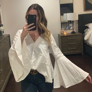 White bell sleeve top